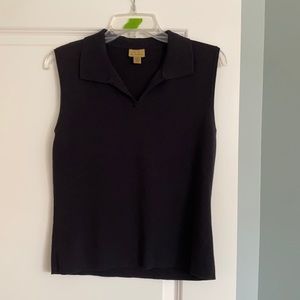 Sleeveless black knit sweater
